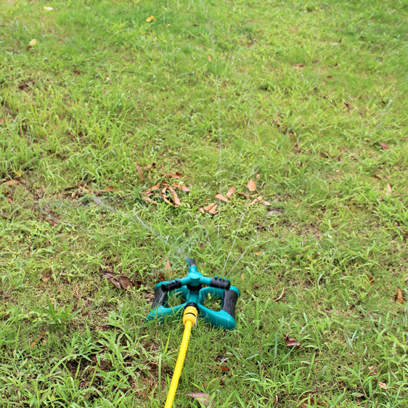 Durable lawn sprinkler with bridge irrigation system, designed for consistent and even watering.