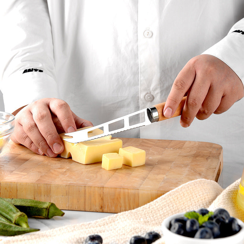 Versatile kitchen tool featuring a wooden handle, combining creative design with practical functionality.