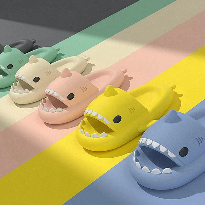 Shark-themed slides, ideal for adding a touch of fun to your casual footwear collection.