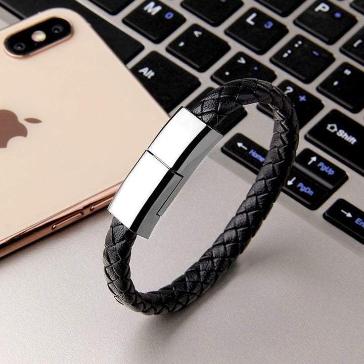Charging bracelet with built-in USB, combining stylish design with portable power for on-the-go charging.