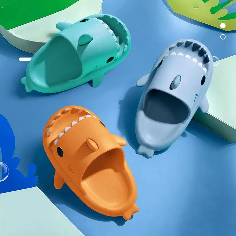 Stylish shark slides, designed with a playful shark motif, offering comfort and durability.