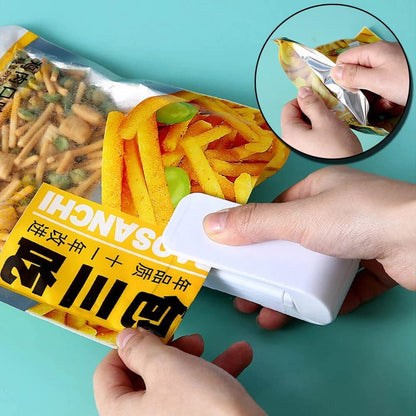 Portable mini heat sealer with a sleek design, battery-operated for convenience, perfect for sealing plastic bags and keeping food fresh on the go.